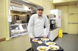 julio with food tray at YM&BẸẸNI